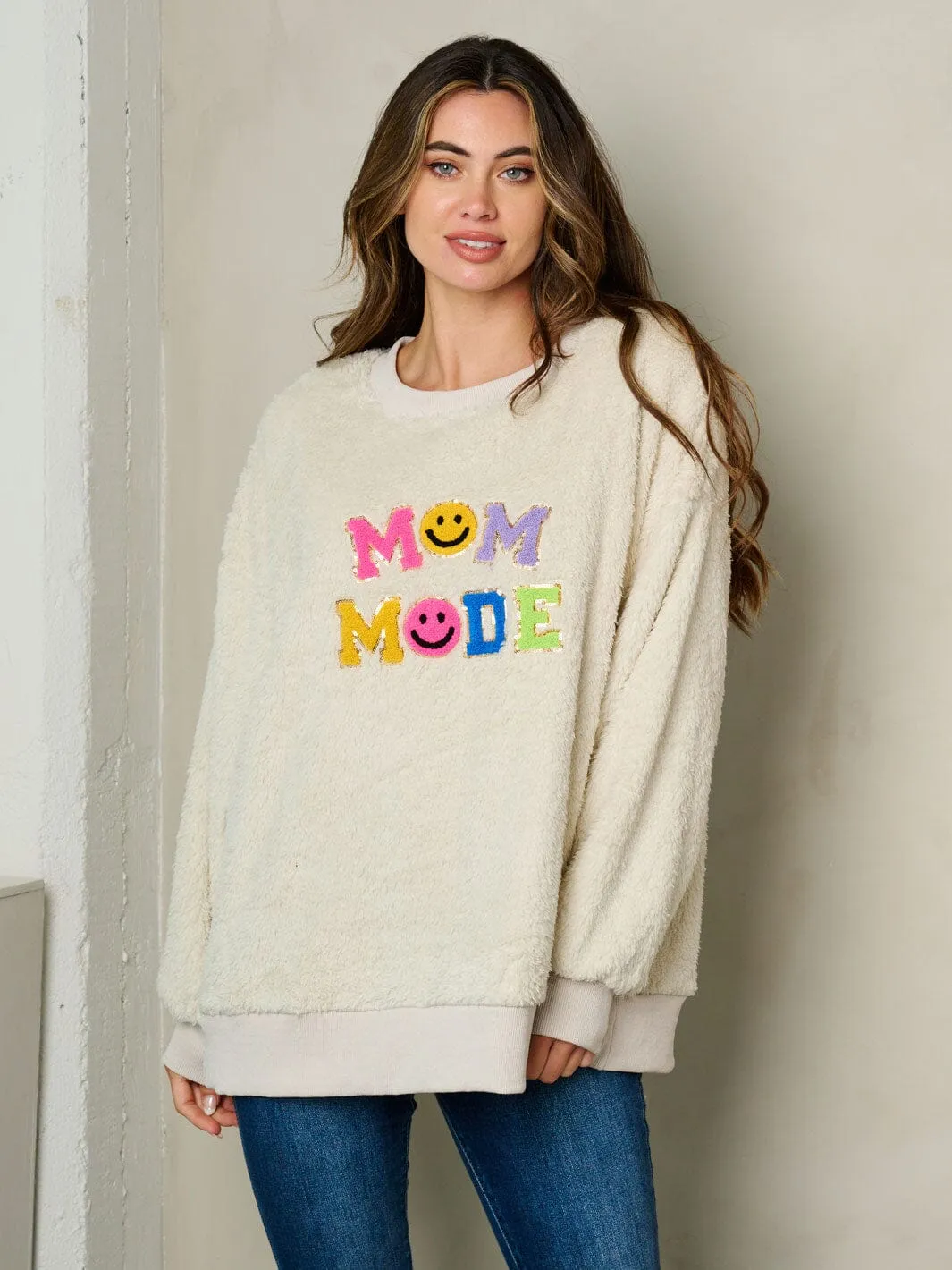 WOMEN'S LONG SLEEVE FUZZY GRAPHIC SWEATER