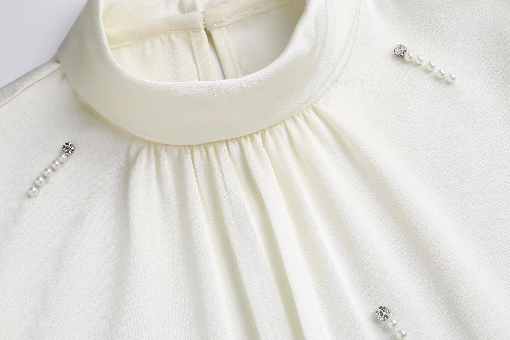 Women's Solid Color Blouse with Long Sleeves and Beaded Mock Neck