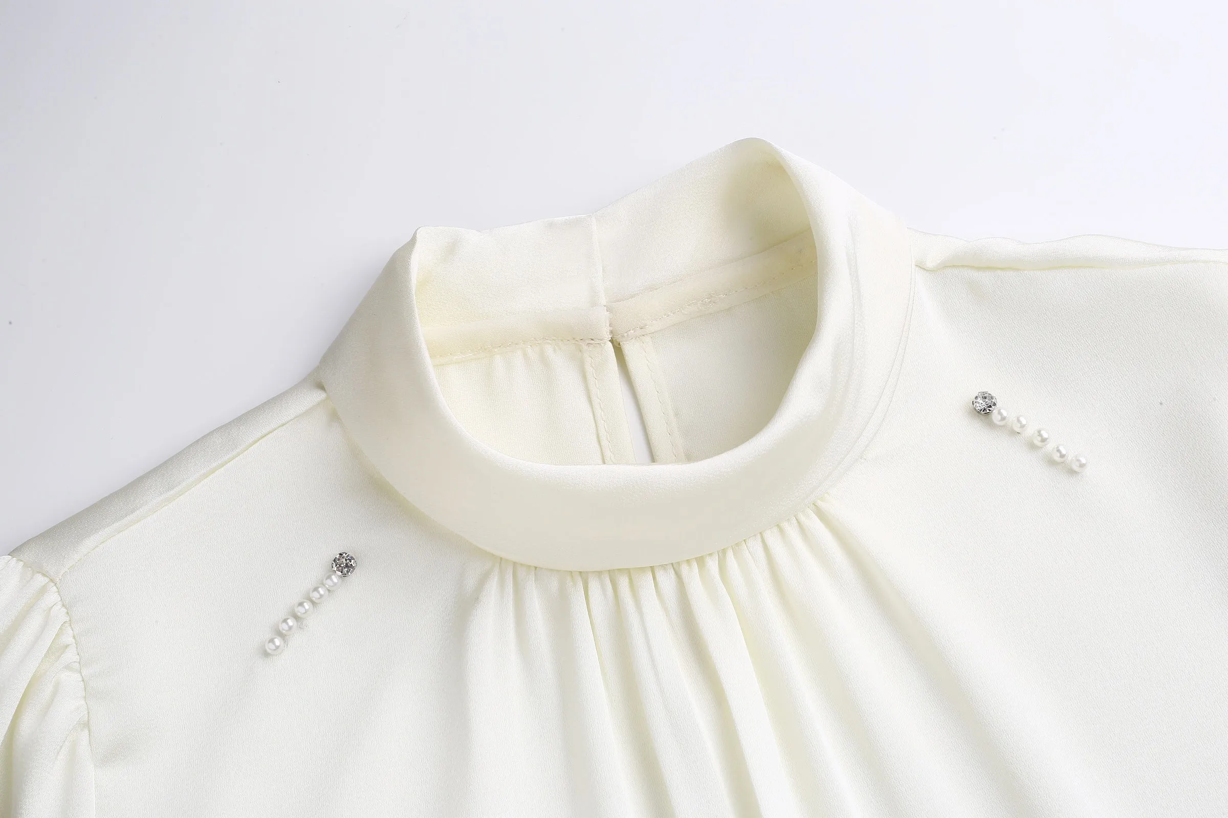 Women's Solid Color Blouse with Long Sleeves and Beaded Mock Neck